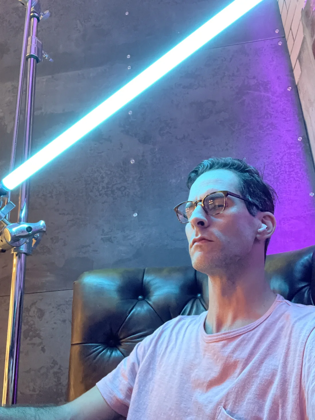 Joel Harrison, lit by neon